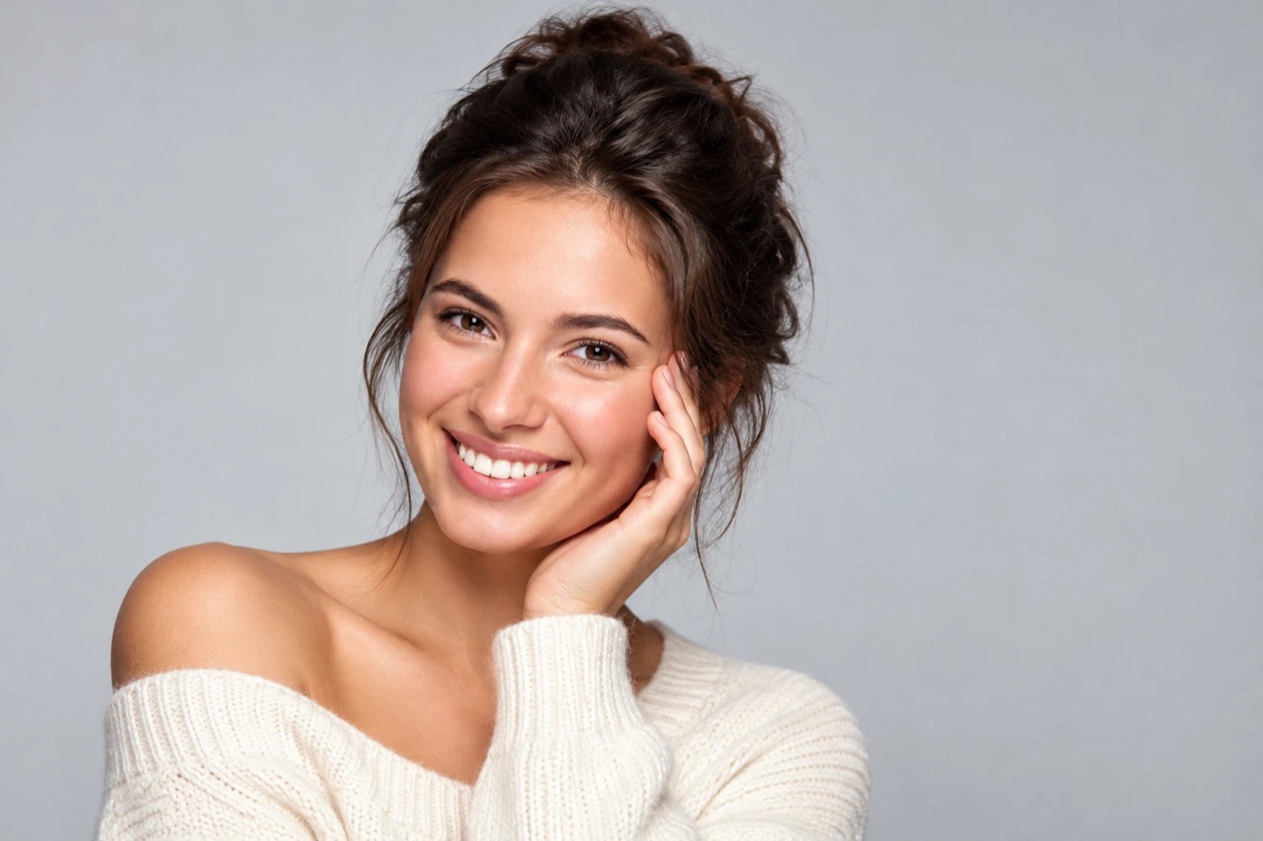 A woman with natural-looking facial features, in soft light